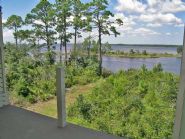 Wire rope railing on balcony by Acorn Fine Homes - Thumb Pic 13