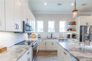 Slone modern coastal piling home on Navarre Beach by Acorn Fine Homes - Thumb Pic 16