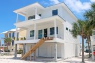 Modern coastal piling home in Navarre by Acorn Fine Homes - Thumb Pic 4