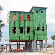 Bergeron modern coastal piling home on Navarre Beach