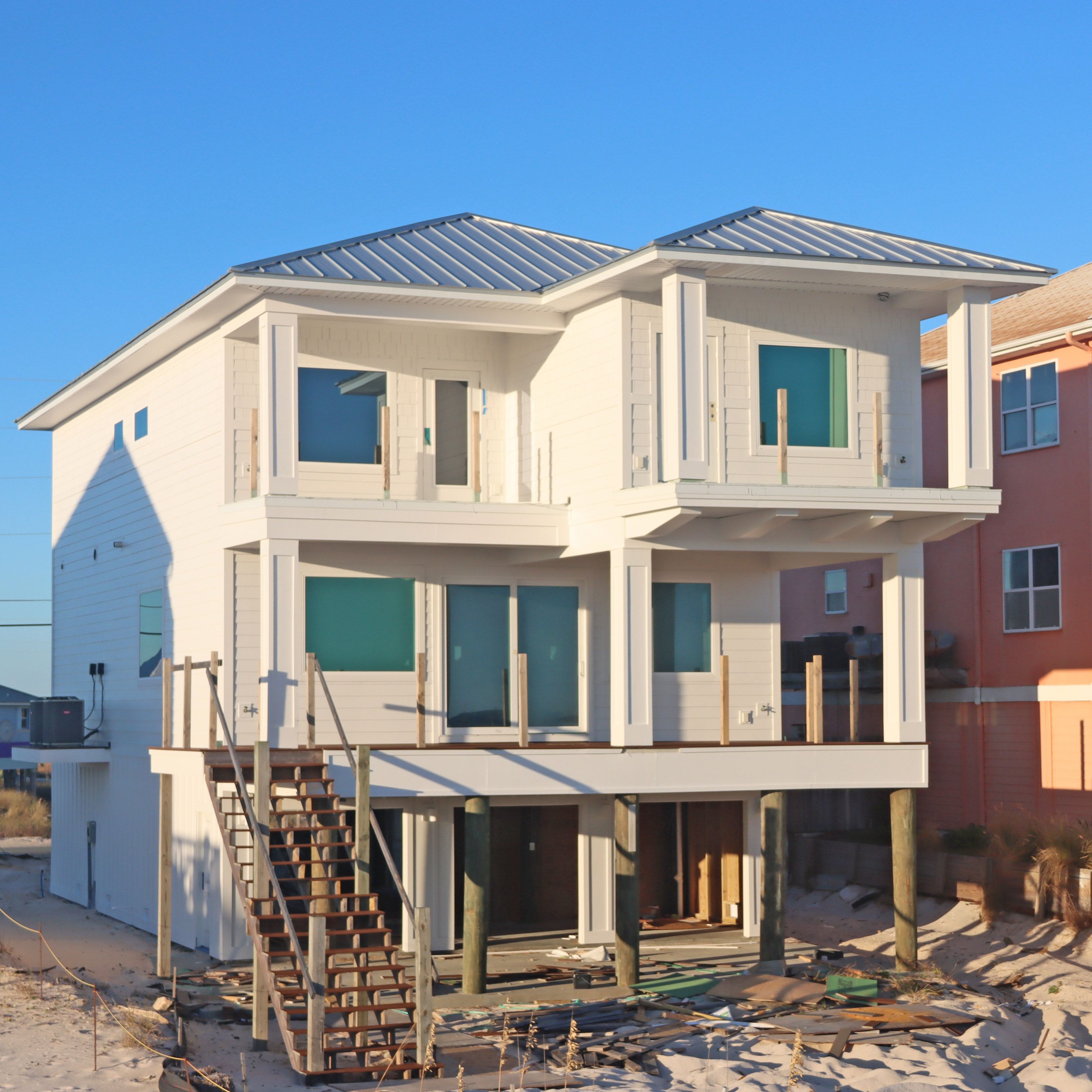 Smith coastal transitional style piling home on Navarre Beach