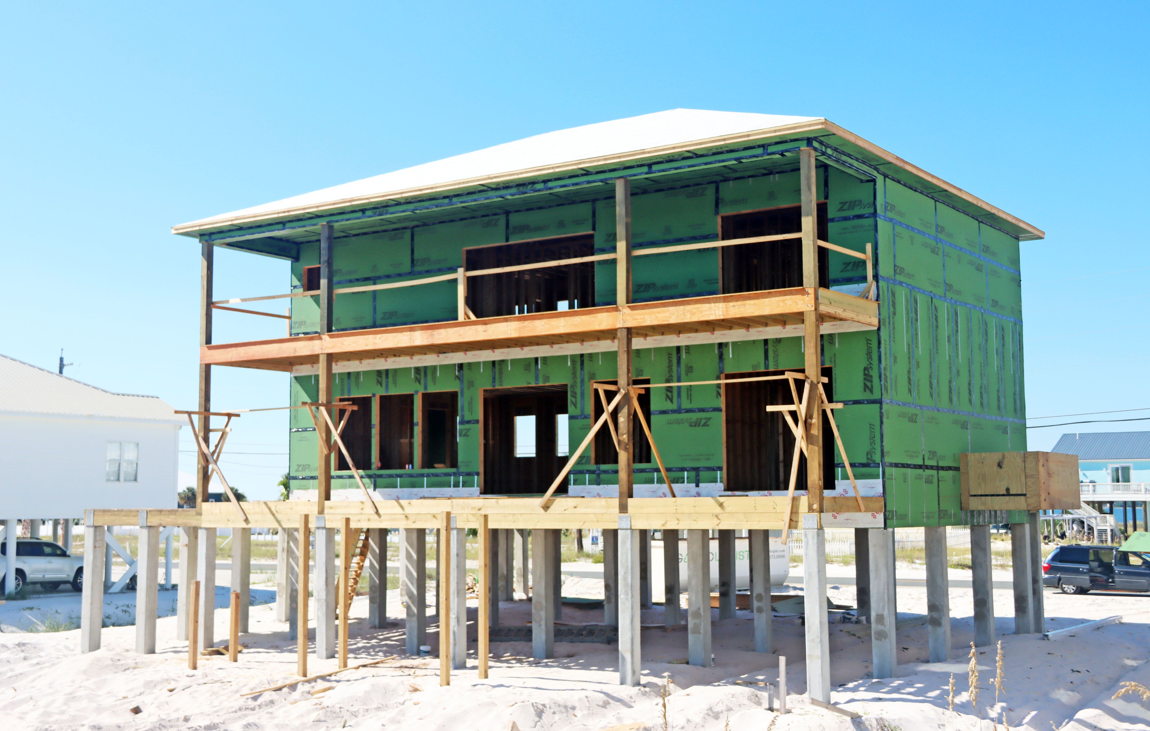 Ramsey modern coastal piling hojme in Navarre Beach by Acorn Fine Homes