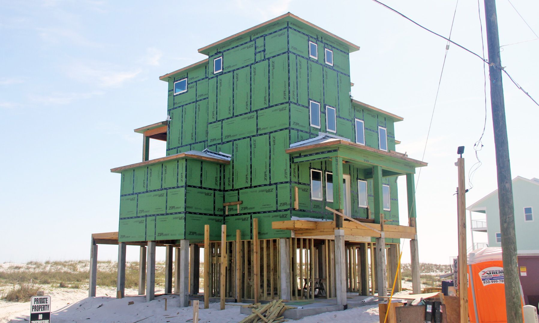 Dubois coastal transitional piling home on Navarre Beach by Acorn Fine Homes 