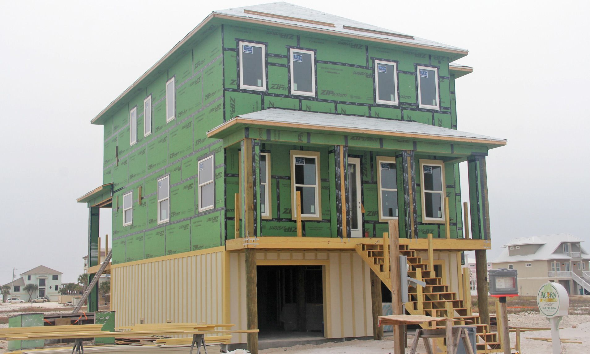 Walker piling home in Navarre Beach by Acorn Fine Homes