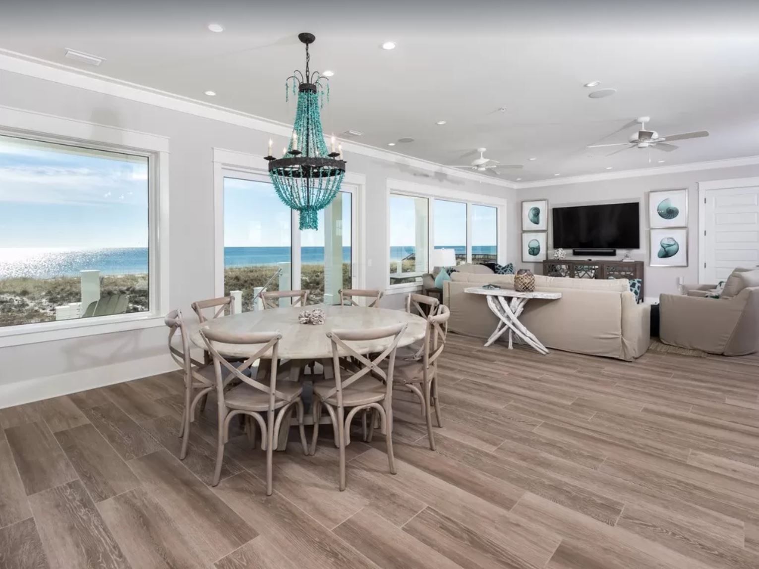 Antinnes modern coastal piling home on Navarre Beach by Acorn Fine Homes
