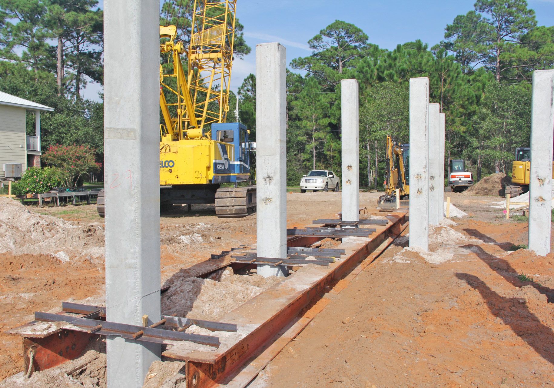 Modern piling home in Navarre by Acorn Fine Homes