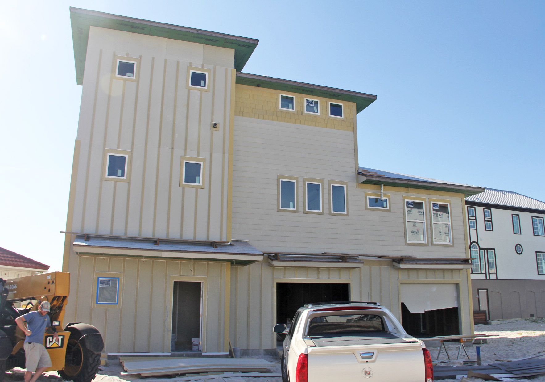 Slone modern coastal piling home on Navarre Beach by Acorn Fine Homes