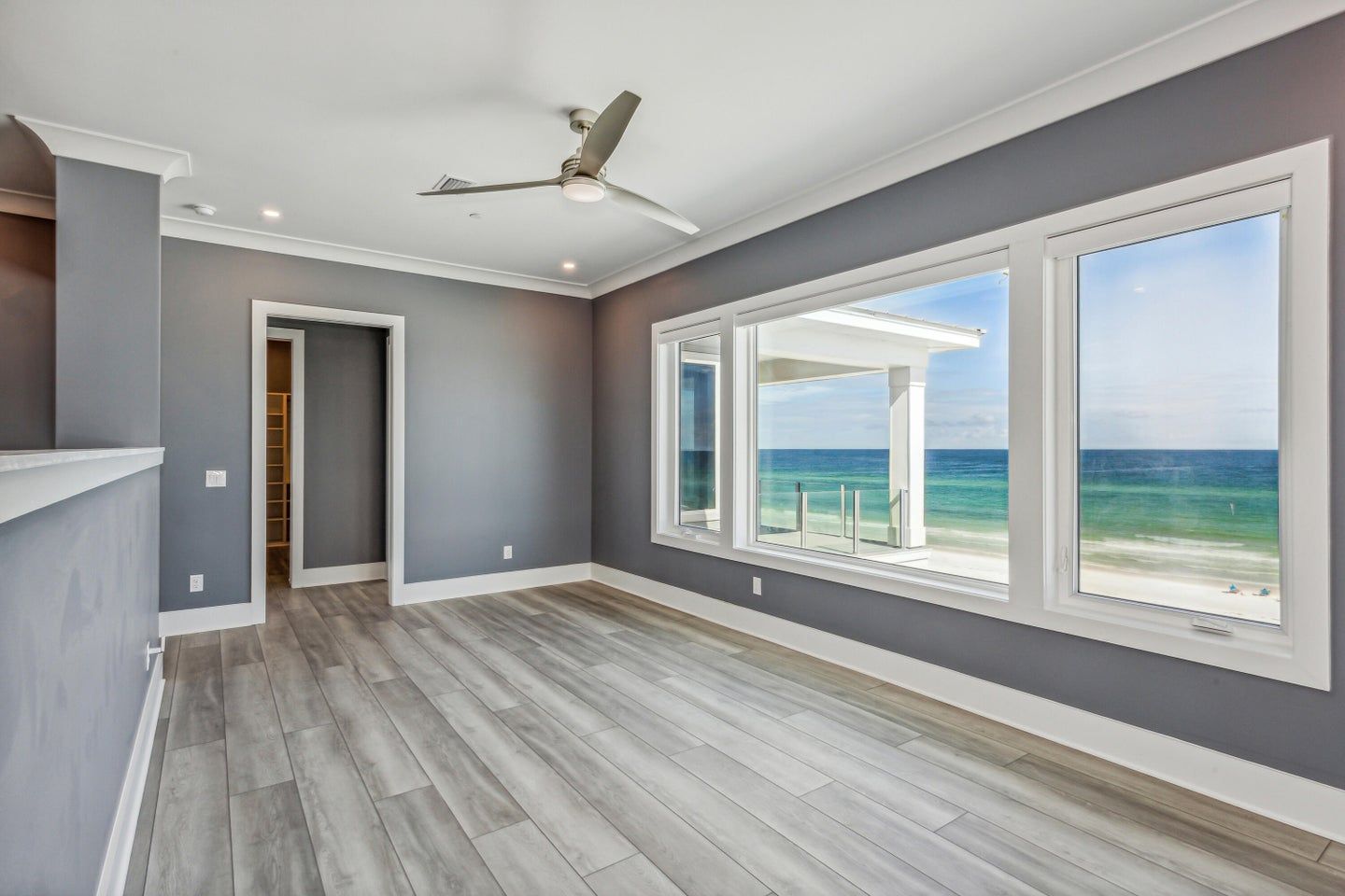 Modern coastal piling home in Navarre by Acorn Fine Homes