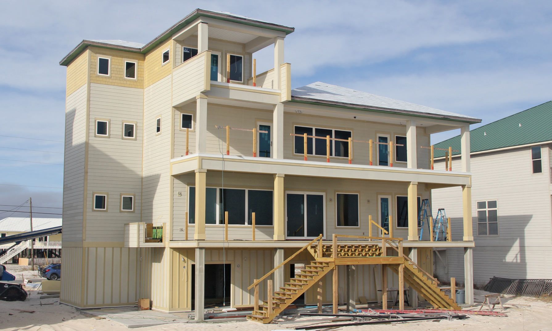 Antinnes concrete piling home on Navarre Beach by Acorn Fine Homes