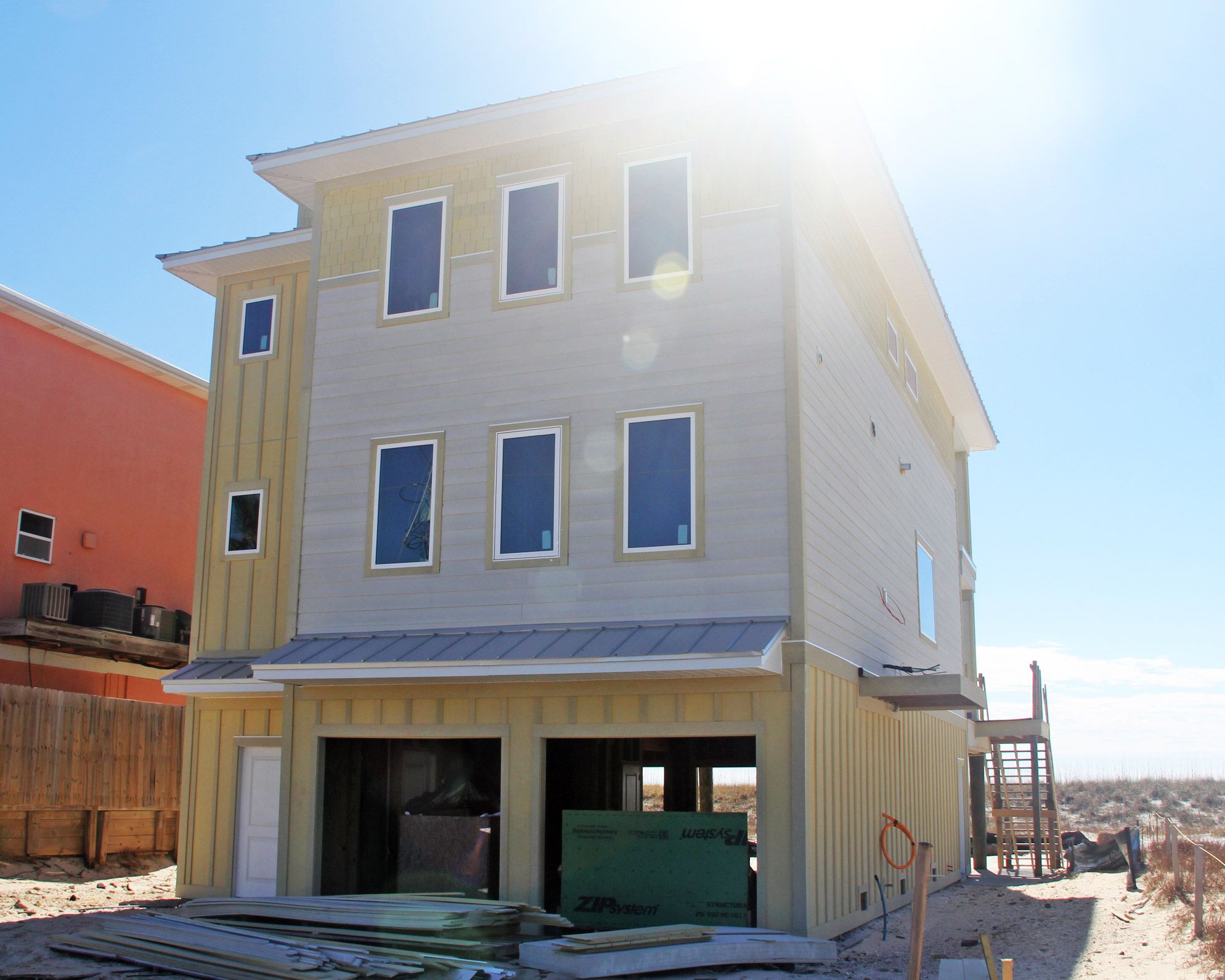 Smith coastal transitional style piling home on Navarre Beach