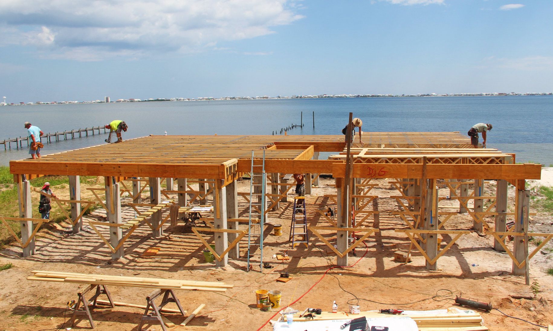 Modern piling home in Navarre by Acorn Fine Homes