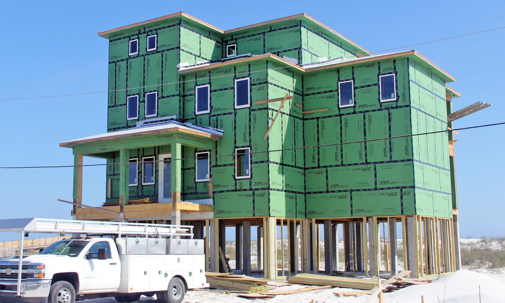 Dubois coastal transitional piling home on Navarre Beach by Acorn Fine Homes 