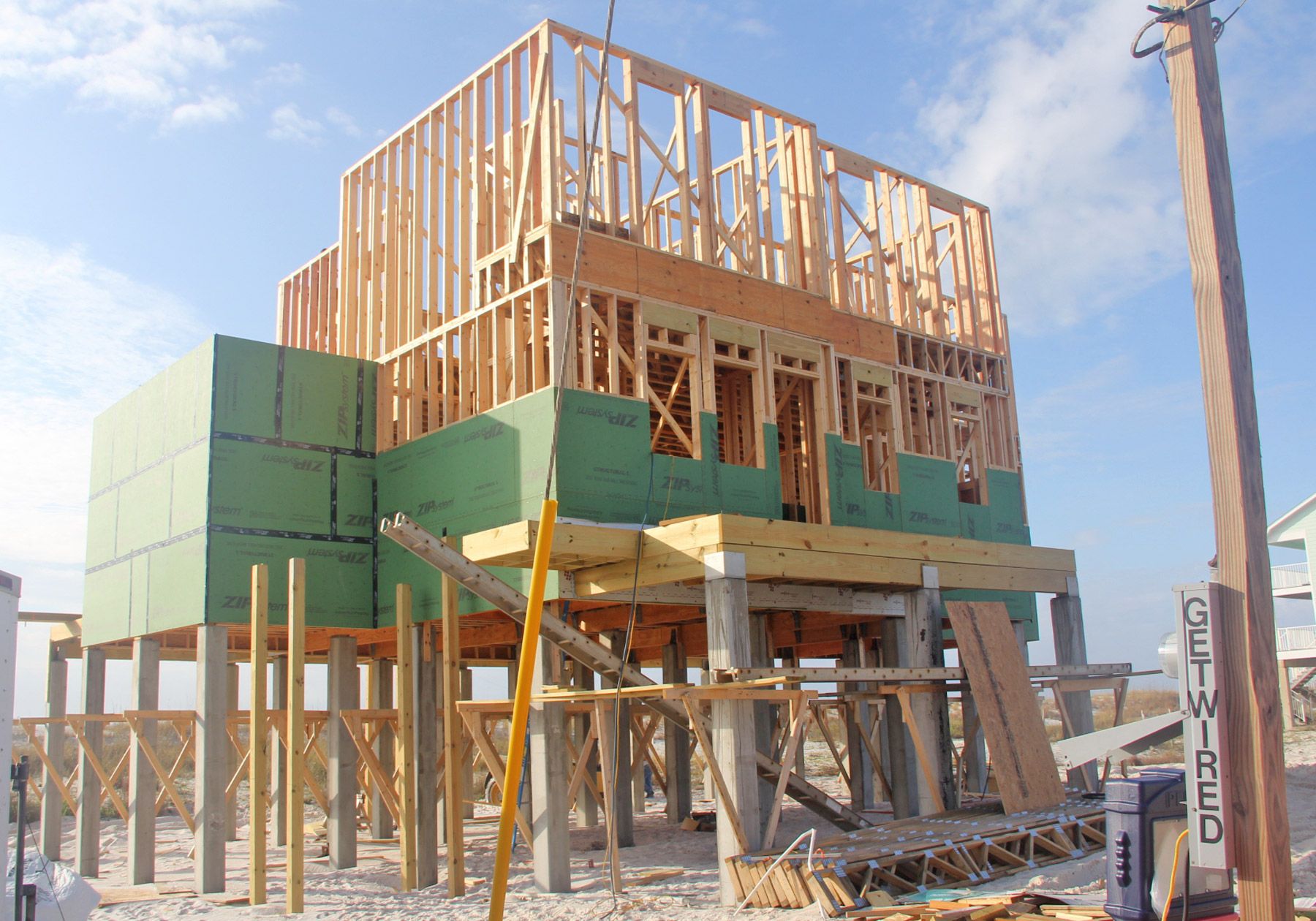 Dubois coastal transitional piling home on Navarre Beach by Acorn Fine Homes 