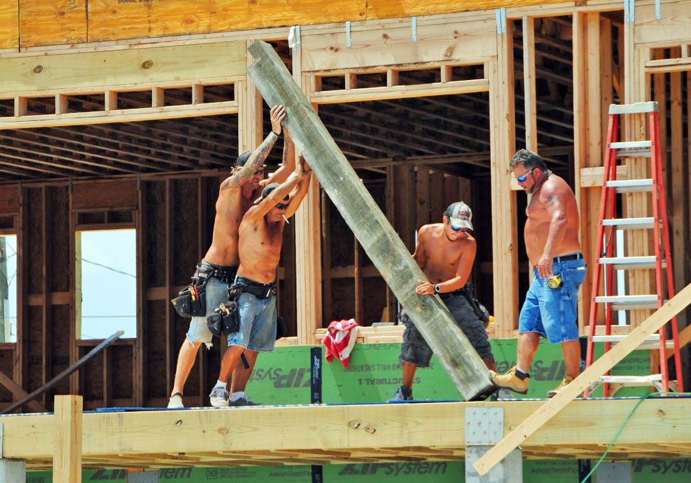 Antinnes concrete piling home on Navarre Beach by Acorn Fine Homes