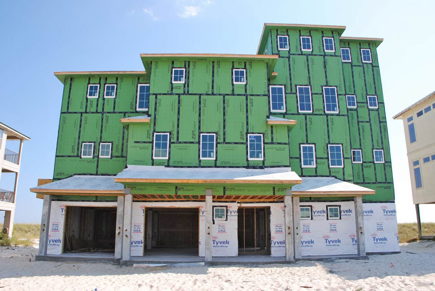 Antinnes concrete piling home on Navarre Beach by Acorn Fine Homes