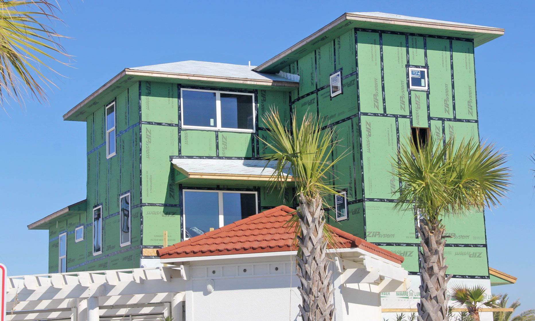 Slone piling home on Navarre Beach by Acorn Fine Homes