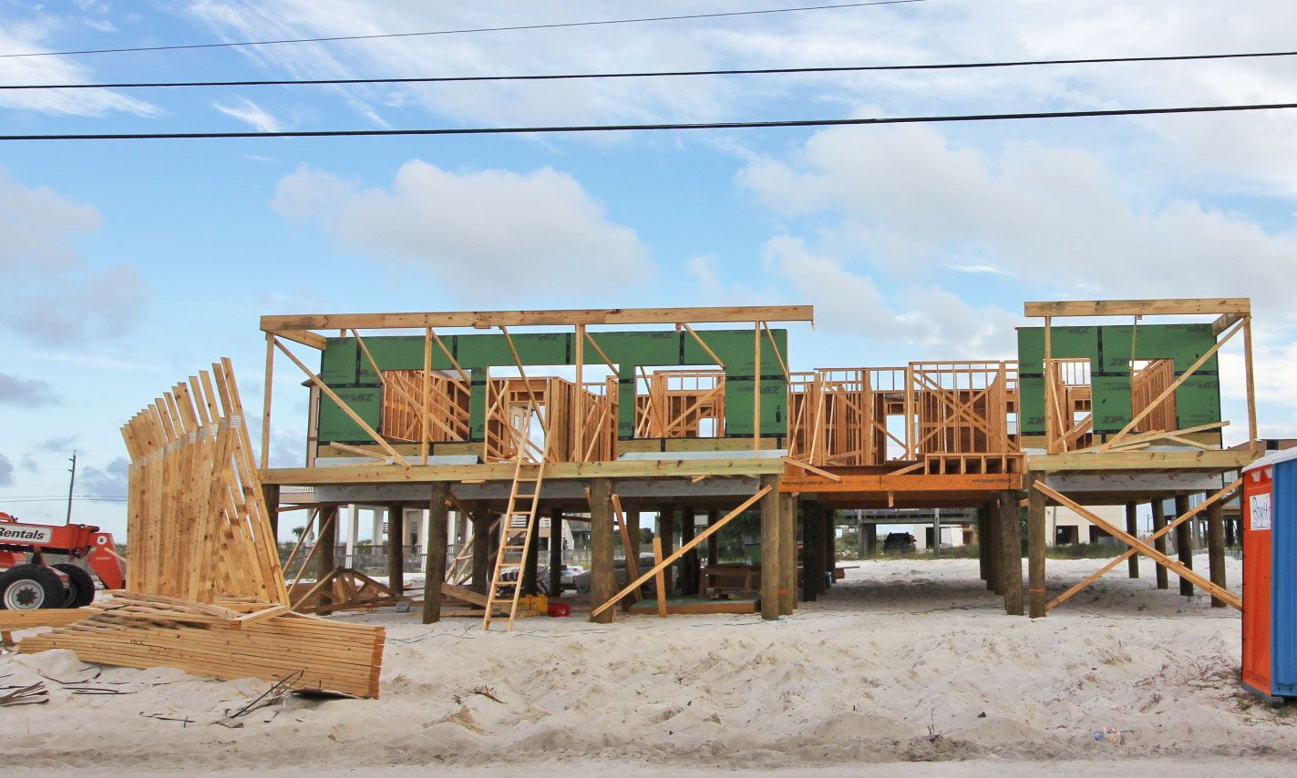 Moreland piling home on Navarre Beach by Acorn Fine Homes